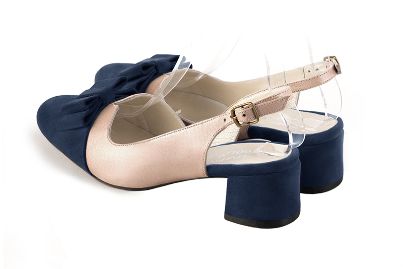Navy blue and powder pink women's open back shoes, with a knot. Round toe. Low flare heels. Rear view - Florence KOOIJMAN